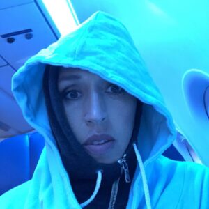 Rebecca Lobo Instagram - When the plane is so cold you have to go double-hoodie on the redeye. #NoFilter