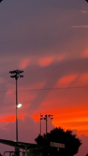 Reed Timmer Instagram - Crepuscular rays with beautiful sunset as the Sooners win their 4th national title in a row in softball!