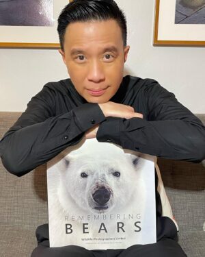 Reggie Lee Instagram - Hey y’all! It’s my birthday today and I’m making it a Bear-day!! 
All Bears are at risk. Climate crisis, human-wildlife conflict, illegal zoos, pet trafficking and the bear bile industry have combined to cause six of the remaining eight species of bears to be at vulnerable or endangered levels. Bears permeate our culture perhaps more than any other wild animal. Smokey, Yogi, Boo-boo, Winnie-the-Pooh. The Three Bears. They are portrayed as wise and friendly. Bears in the wild deserve better.

Help to save them by ordering your copy of Remembering Bears today (link in my bio) at www.buyrememberingwildlife.com 100% of all profits go directly to vetted programs dedicated to protecting bears. @rememberingwildlife #RememberBears #RememberingWildlifeDay