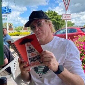 Rhys Darby Instagram - Spotted fake reading the fabulous new book by @schreiberland The Theory of Everything Else. Get yourself a copy immediately. Look how smart I look! There's some truly weird stuff in here. Perfect holiday material. @thecryptidfactor Yes, we'll record another episode soon!!