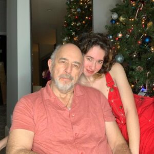 Richard Schiff Instagram - Happy 21st to my most beautiful, stunningly talented grown up daughter.  I love you 21 times more and then add infinity. Follow her if you dare. @rub.y.y 
Daddio