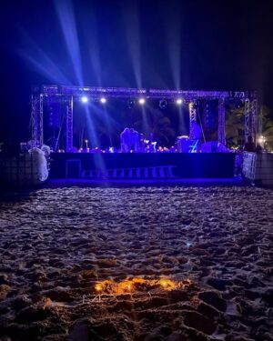 Rick Springfield Instagram - It’s the one-year anniversary of Matty leaving us so we had a little ceremony on the beach for him before the show tonight and yes that’s a Matty pool toy. He would love it. And after the beach show tonite MATTY’s candles are still burning 🔥
