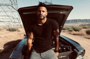 Ricky Whittle Instagram - What ya think of the bad boy look?
Would ya stop and help a brother out?🤷🏾‍♂️

Putting out my #Badboy vibes finally working with the incredibly awesome and talented @chelsealaurenla 📸🔥
Soooooo many fantastic shots and sooooo much fun. Of course finished off with a warm chocolate cookie skillet with ice cream and hot fudge sauce because …🤷🏾‍♂️😜why not😝 #photoshoot #badboy #chelsealauren #desert #1967mustang #GT500 #shelby #shelbygt500 #eleanor #tattoo #magichour #model #actor