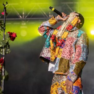 Riz Ahmed Instagram - The Long Goodbye x Glastonbury 2022 💐🙏🏽

Photo: @iso400mike
Outfit: @rastahofficial