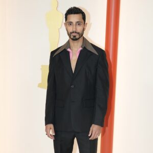 Riz Ahmed Instagram - It was a good one this year, wasn’t it?

Shout out to the Daniel’s for changing the game, and @kehuyquan who I watched endlessly in Goonies and Temple of Doom as a kid - ahead of his time back then, and now back to claim his rightful place. 

Styling - @julieragolia
Hair - @michaelduenas
Clothes - @prada & @vacheronconstantin

Photos: @gettyentertainment
