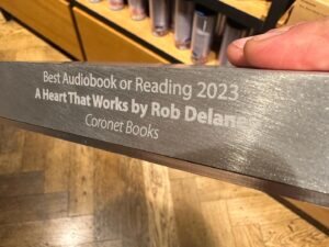 Rob Delaney Instagram - Last night A HEART THAT WORKS won Best Audiobook from the UK’s Radio Academy. It is of course bittersweet to win an award for a book about our son Henry, who died five years ago of brain cancer. I said in my unplanned speech that I’d rather have been tucking him in to bed than accepting the award. But I can’t do that because he died. I am, however, grateful that people are reading and listening to the book. I love that so many people know about Henry. I am so happy that so many other bereaved parents and siblings have read the book and told me they recognized themselves in it. 
People seem to really respond to the audiobook which I guess makes sense since it’s such an intimate personal story and it’s read by the guy who wrote it. 
Was particularly happy to be presented the award by @josierones! 
Anyway I miss our dear Henry. Look how happy he is in the last picture. ❤️📚