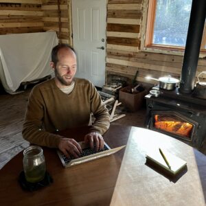 Rob Greenfield Instagram - Hello from my quiet little log cabin in wintery Wisconsin!

Since I last wrote to you 3 weeks ago, I have spent 130 hours at this table writing by the fire.
I have written and updated 43 articles on my website, many of which I’ve been wanting to publish for over 5 years. Most of these are foundational to my service that I will continue sharing and referencing for decades ahead. Many of these articles dive deep into the philosophy that drives my pursuit of truth and integrity. In many ways my life is my message and over the last few years I was so focused on my community programs and managing a team that I fell very behind on my writing. It has been healing to share many of these words publicly. 

My time at the cabin has been incredibly productive and is contributing to a solid foundation for my life of service. Besides the 130 hours of writing, I have spent another 30 hours at the community center working bringing everything I do into integrity.

All the while I have been swimming in the cold waters of Lake Superior and the little creeks that pass through the forest near the cabin. I’ve been eating the bounty from Earth that I harvested this summer and fall. I’ve had more days of silence and solitude, spent the least time on the internet and I’ve been resting more than almost any other chapter of my life. I have awoken before sunrise nearly every day. I have felt very whole and complete within and this time alone is proving to be important in my personal development.

I have much to be grateful for and on most days I recite this gratitude whether on paper on my days of silence or out loud on my bike rides or walks. The writing of Wangari Maathai, Michelle Alexander (The New Jim Crow), Nelson Mandela, the Dalai Lama and Mahatma Gandhi has continued my education and inspired my service.
This week I will take a break from nearly everything in life for 10 days of silence through Vipassana meditation. I will focus solely on coming into a deeper state of integrity with the aim to be of highest service to Earth and humanity. I will share about this the morning before the retreat begins.

Upon my return I will spend 3 weeks completing my Food Freedom book.
Love,
Robin