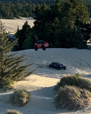 Robby Gordon Instagram - A few cool shots from @utv_takeover on Friday. We will be out here again today at Coos Bay Oregon. Car was super fast yesterday in the short course races it was a full sand course and even on dirt tires we advanced all the way to the finals 🔥🤪 after the races the guys from Rogue Sand Tires hooded me up with some 35” Sand Tires and dammm should of had those for the races 🤦🏻‍♂️