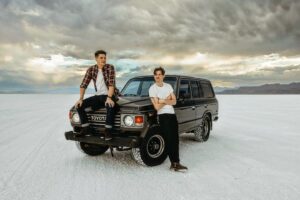 Robert Palmer Watkins Instagram - Y’all ever been to Utah? The scenery is just unreal. It’s hard to believe that’s salt covering the ground and not snow. @rgaiphone and @elijah__quinn  showed me around last week. We shot my ‘Walking Dead’ music video here a couple of years ago and it was awesome to get back and explore more with the boys.

📷 @robertadamsonphotography

#utah #saltlakecity #photography #landcruiser #cruisin #saltyashell #skyline #heaven #summer