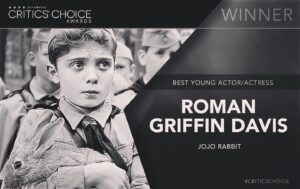 Roman Griffin Davis Instagram - @criticschoice Dear Critics Choice, thank you so much for my acting award. I’m so sorry I couldn’t be there. I had to go to school but thank you very much. I would like to also mention I had the incredible support of Archie, Thomasin, Rachel and Taika. Thank you to them too. And thank you Critics for seeing beyond my bad 🦷 🦷.