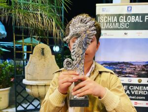 Roman Griffin Davis Instagram - I met the kindest boy this evening Federico Lelapi at the Ischia Film festival. I look forward to seeing him in Pinocchio. Thank you to Pascale and Trudie for introducing me to the amazing Ischia and for my very heavy seahorse #ischiafilmfestival