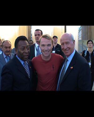 Ronan Keating Instagram - Incredibly saddened to hear of the passing of the Great Sir Bobby. An iconic & worthy ambassador for the game but more importantly a great human. His generosity of spirit towards our families charity @mariekeatingfoundation and to my family, always blew me away. Rest up old man. Thank you for the love and the memories and God bless ya. 

This pic was back stage at The World Cup opening party in Berlin. 🤍