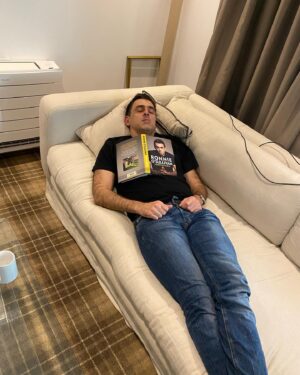 Ronnie O'Sullivan Instagram - MY BOOKS OUT!! Grab a copy today! However…if you don’t like it, fear not. There a number of different uses for it. Swipe to see: 
A) coaster
B) door stop
C) something to send you to sleep

#UNBREAKABLE