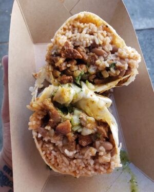 Roy Choi Instagram - Y'all already know how I feel.
What a fun opening night to our first full week.
Found a fun hack: order caramelized kimchi from the Kogi truck and put it on your Tacos Por Vida.
See you again, tonight.
Tacos Por Vida
3434 Overland Ave 
LA
5:30pm-10:30pm
Shout out to @wearealchemy for being our home for this run.
As per tradition, last photo is first in line.
#tacosporvida 
#KogiPorVida