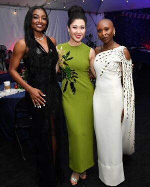 Ruthie Ann Miles Instagram - One of the joys of working with a top notch company like the one assembled by @fogelsean, @michaelcarney & Michael Colbert (but I couldn’t @ him; I don’t think he’s on IG) is that they literally collect people from across our country(!) so we can play together & enrich one another -  and I’m THRILLED that they’ve included 💛BROADWAY (& BROADWASIANS 🤩) to join in 🤩

Here are some BtS by @slovekinpics (Steven Lovekin!) of 
@wongbd - @patinamiller - @cynthiaerivo - @bryancranston & I loving on each other. I’ll commentate on what’s happening.

—Planted in between & soaking in the rays of two of my Queens.
—We pulled B.D. in to join us 
—Cynthia just finished a solo while I went on deck to prep for mine. She was walking down the ramp as I walked up. Perfect timing to snag a little #ALittleNightMusic photo. (I. Can’t. Wait. To. Hear. Her. Sing. MILLER’S SON!!!!)
—I don’t know how I got so lucky to have these two voices singing in my earholes for the finale. We took this immediately after saying Goodnight America. 
—I. Did. Not. Know. Bryan. Cranston. SANG. I tried to give him my mic to hold in the finale, but settled for holding it by his shoulder. What a lovely baribass!!!! <swoon>
—Here’s me grabbing BD by the face to let him know how much I’ve admired his presence and command in our industry, his humor and heart, and his fight for representation and inclusion. (If I grab you by the face it’s because I love you. So take it personally.)
—Did you know there is an Ice Box (which is exactly what that sounds like) for the sweaty or melty folks on the hot summer evening stage?! How considerate! I took a step in for a few moments to say I’d done it. (I did it!)
—There was an after-ceremony ceremony & party where I was asked to sing God Bless America a capella. I really should have thought about the higher end of the melodic scale (I didn’t.) But once I started I had to go with it, up in the stratosphere.. I asked the audience to sing along with me - knowing that it was in a MUCH HIGHER KEY than they had sang it at the Memorial Day Celebration 😅 Y’all were good sports - and the acoustics were terrific! We sounded great! (Thank you Jorge @joegeacevedo for the capture!)