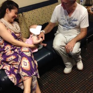 Ruthie Ann Miles Instagram - Part Five. 

When I was 2 weeks postpartum Clint called to say I’d be wearing a bathing suit.
Abby was just over a month old when we started rehearsals at the Public - incidentally the same month when we shot Annie Leibovitz’ Vogue piece. And NYMag. I was so bloated and full to bursting. 

I could barely walk to the subway. I cried so much, so often. Everything hurt. (I cursed Korins’ Hypnobirthing.) 

The worst was I was barely sleeping. I pumped milk every two hours in the bathroom where everyone did their business b/c there was no open dressing room yet. Eventually one opened up & I brought in a playpen so Abby could nap & spend her days with me. It was the greatest, greatest gift. 

From utero she knew the songs. She sang them, danced to them, played them on piano (and xylophone. Don’t gift toddlers xylophones), sometimes even let me harmonize with her. 
SevenYears was her midnight bathroom lullaby. She watched anything where David was dancing. (She loved his music, but mostly his dancing.) I have more videos than I care to count of Abby singing our songs - because she listened to the show every day thru the monitors. In her bones. 

Between shows George and Jeigh zoomed her around in laundry baskets. Airplanes. Rollercoasters.  We ate a lot of Library fries. I put too much Oregano Oil into Conrad’s mouth. Sorry about that. 

Justin told me stories about Sharon Jones.

Every professional or production photo was taken  when I was within 100 days of giving birth. Posterity photos are forever. I’ve learned to be less critical of them, but my vanity does sometimes makes me look away.