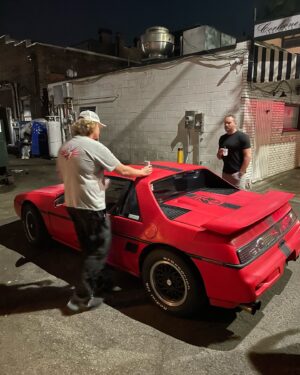 Rutledge Wood Instagram - We walked outside last night & heard a guy showing his friend his new ride…I look to my left and see a Pontiac Fiero. 1988. Formula. Manual. With the 3.4 V6 swapped in it. This guy was beyond pumped to show us, and being a bit of a Fiero nerd myself, I loved every second of it. Make new friends. Go on crazy road trips. Make the memories yall ❤️ Thanks @jmcjenkin for having a Bro Trip with me!