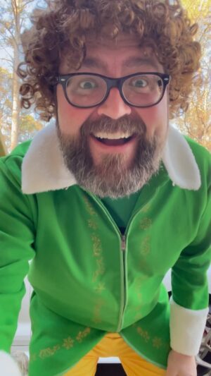 Rutledge Wood Instagram - Buddy the Elf, what’s your favorite color ?! ❤️❤️ That @toyotausa @toyotaracing GR Corolla peeking out behind me! Proud #ToyotaPartner