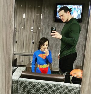 Ryan Dorsey Instagram - Took the Little Man Of Steel to the gym 
 #Superman #Saturday
🦸‍♂️
Couldn’t find a phone booth to change.
💪
“What’s a phone booth, Dad?” 😂
So we learned something today.
😂
Ice skating skills trending⬆️!
#dccomics #dadlife #dadlifeclub #marchmadness