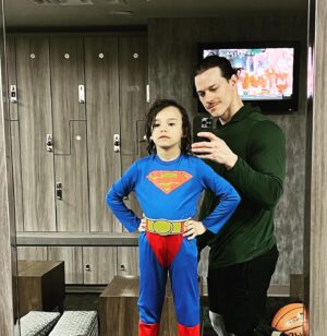 Ryan Dorsey Instagram - Took the Little Man Of Steel to the gym 
 #Superman #Saturday
🦸‍♂️
Couldn’t find a phone booth to change.
💪
“What’s a phone booth, Dad?” 😂
So we learned something today.
😂
Ice skating skills trending⬆️!
#dccomics #dadlife #dadlifeclub #marchmadness