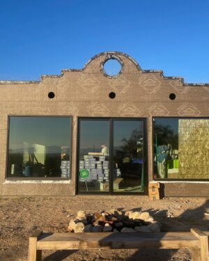 Ryan Heffington Instagram - The story of Ryan Heffington’s Residency  D E S E R T R A D E / @desertrade29 
29 Palms, CA 

In July of 2020, when the world was in disarray, with 
so many questions unanswered, i followed my instinct 
and moved to where felt like the edge of the world, the 
Mojave Desert, CA. Like most of us, I was searching for 
solace. With stunning views of mountains for as far I could see, and the sound of silence, I found myself isolated away from my friends and community. 

A community builder by nature, where now was my foundation to bring people together and enjoy life? Like I did in LA over nearly 3 decades, I started throwing a dance night, at the last bar, appropriately named THE OUT THERE BAR, on the edge of the world, that brought queers, marines, bikers, locals and Brenda an 81 yr old dance enthusiast together in the name of having a good 
time. We danced and partied together, met new friends and sweated a lot. However once a month or every few months thrashing on the dance floor wasn’t as fulfilling as i hoped. That’s when the universe interjected. 

My neighbor, a realtor, asked if I wanted to see an ‘unique’ property she was to put on the market that following Monday. “It’s not for everyone”she stated. Who doesn’t love looking at potential dream properties, even 
if were just for dreaming. With a friend we casually arrived and within 10 steps onto the property, I grabbed and squeezed her hand whispering, “I’m opening a residency”. And here we are. 

follow @desertrade29 for updates   programming