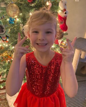 Rylea Nevaeh Whittet Instagram - Merry Christmas 🎄 check out that Netflix ribbon 🎀 #merrychristmas #christmas #christmas2021 #ryleawhittet #ryleanevaehwhittet #maddyfrommaid #netflix @netflix #smileyrylea #smile #blueeyes #reddress #christmasnails #christmasdress