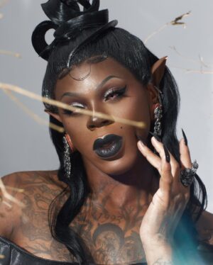 Saint Instagram - When my drag journey began I could have never imagined being here now. 🥀

📸: @ericrichardmagnussen 
Hair by : @wigsbyatlas 
Designed in collaboration with @mr.oystr 
Made by : @plastiquepussey 

Garment made by : @plastiquepussey