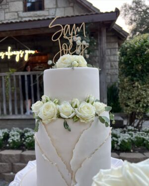 Samantha Cope Instagram - it was always you 🤍 @joeylawrence 

Scroll to soak in all the dreamy vibes ☁️🕊🌿! also the last pic is one I personally took in the middle of our dance party because I am so obsessed with how beautiful our cake turned out haha. I love the different textures from tier to tier. What do you think? #vibes 

photography: @wildwhim | venue: @tcreekinn @tciweddings | planning and florals: @hcdweddings | best chef in the world: @chefmsteffen @corkfirekitchen | cake: @cakestocelebrate | tabletop rentals: @hostesshaven | rentals: @rusticurbanevents | dj: @pacificentertainment | makeup: @malloriemason | hair: weddingdaybeauty_bylaura