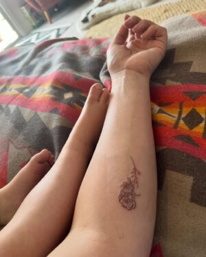 Sara Coates Instagram - Just a modern woman with an inflatable hot tub and a marigold tattoo