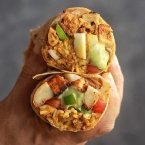 Saransh Goila Instagram - Show us some love on our new series *Feels wale Meals* This series is based on your popular request of making wholesome meals and daily wala nutritious meal planning for home with a bit if chef-ness. Episode 1 is inspired by a brand I had created a few years back called Bambai Meal Rolls which essentially packs carbs, protein, fibre and fat all in one roll just like a burrito would but the flavour and ratio of each ingredient totally depends and can be switched as per diet and preferences. For instance I like more protein (paneer or chicken) in my wrap versus more rice. Also you can keep making newer meal rolls with different fillings and flavours every time. It's a formula tested in time - all you have to do is adapt it to your home and surroundings. Would you like more episodes of #FeelsWaleMeals and what would you like to see? Tell me!
.
.
Gongura Meal Roll

Gongura masala 

1 tbsp Mustard oil 
1 tsp Mustard seeds 
1 Green chili, chopped 
1 tbsp Ginger garlic paste 
Sauté everything well 
1 Onion, chopped
Sauté till translucent 
2 Tomatoes, chopped 
Mix everything well 
1 tsp Red chili powder 
1/2 tsp Haldi powder 
1 tsp Garam masala powder 
1 tsp Coriander powder 
Salt to taste 
Mix everything well 
& let it cook on slow flame for 5 minutes 
2 bunches of Gongura leaves, plucked & washed 
Add them 
& mix well & cook for 5 to 8 minutes 
Look at that 🤤😮‍💨

Rice
1 cup Boiled rice 
1 tbsp Ghee 
1/2 cup Gongura mixture 
Mix everything well 
Taste some 😮‍💨🤌🏻

Protein
Shallow fry a few paneer or chicken pieces 
with the Gongura mix 

Dip
1 cup Hung curd 
A few dried curry leaves 
1 Green chili, chopped 
1 tbsp Mayo (Optional) 
Salt to taste 
Blend everything well 
🤤

To Assemble 

Add a layer of the rice 
Spread curry leaf mayo generously 
Add pico de gallo (or kachumber salad)
Pickled veggies 
More mayo 
& roll it tight 
Cut it 

Delishaaas 😮‍💨🤤