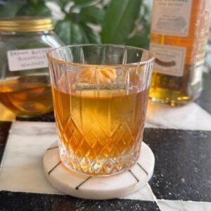 Saransh Goila Instagram - Can't believe how good this is! Goila Butter Whisky 🥃 to celebrate 100 kitchens of Goila. This is the perfect celebration cocktail I could have asked for! All thanks to @kunalbhimji who generously offered to help me with a Brown Butter Old Fashioned recipe which we made with Bushmills and oh man it was so smooth and just Delishaaas. That cookie kinda buttery flavour made it extraa special. We have a big announcement coming up for GBC in the coming week and this was a perfect way to celebrate. We should do this more often, Kunal. Also guys it's super simple to make this at home, so make and celebrate with us and of course try only if you're above 25 years and be responsible!
.
.
Goila Butter Whisky 

100 ml butter 

Brown it until nutty and light brown in colour 

Add 500ml Bushmills Irish Whisky

Shake it well and leave it out for 2/3 hours (shake every 30 mins) 

Transfer to the fridge for 1 to 2 days 

Remove the solidified residue and strain the rest through a filter to get brown butter Bushmills. Save the butter and reuse later.

Assemble the old fashioned 

1.5 tsp brown sugar 
Orange Bitters or regular bitters 
Orange peel 
60ml brown butter whisky 
Cookie for garnish or maraschino cherry