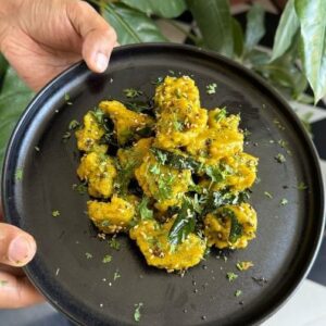 Saransh Goila Instagram - Bafauri is a super healthy and delishaaas steamed snack popular in central Indian states of Chhattisgarh, Bihar and Madhya Pradesh. Also very popular in UP it kind of reminds you of stuffing of farra, goonja or peetha. While Bafauri is made with Chana Dal in some communities they also make it with masoor and green moong in UP and Bihar. The process in Bihar differs a little as they deep fry it in Mustard Oil and many also call it Chatka. When steamed it's usually called Bafauri. There are many similar versions of this recipe across India and it'll be nice to hear about them from you guys and if you have memories share with us :) Personally I love how simple, nutritious and delishaaas this snack made with chana dal is!!
.
.
Bafauri 

2 cups Chana dal, soaked 
2 Green chilies 
1 inch Ginger, chopped 
A few garlic cloves 
A handful of fresh coriander 
1/2 tsp Hing 
1/2 tsp Jeera 
1 tsp Red chili powder 
Salt to taste 
Blend everything into a thick batter 
Grease a steamer thali
Place small blobs of the batter 
& steam the bafauri for 12 to 15 minutes 
Insert a toothpick to check if it’s cooked through 

1 tbsp Mustard oil 
1 tsp Mustard seeds 
A handful of curry leaves 
1 Green chili, chopped 
1 tsp White sesame seeds 
A handful of fresh coriander, chopped 
Add the steamed bafauri 
Toss well 
Garnish with fries curry leaves & coriander 
Serve hot 
Delishaaas 😮‍💨🤌🏻