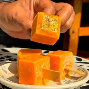 Saransh Goila Instagram - These grandma hacks still work seamlessly and nothing tastes as good as this Mango Kulfi (trust me) It's Delishaaas and the right portion size and only takes 15 mins to assemble. You can choose to add condensed milk instead of rabdi and omit sugar as that will be much sweeter than rabdi. Will you try? 
.
.
Mango Kulfi 

3 Mangoes 
1/2cup Rabdi or condensed milk
3 Bread slices 
1 cup Whole Milk 
1/4 cup sugar (depending on how sweet mangoes and rabdi is)
Blend well 
Add chopped pista & mango pieces in an ice cube tray 
Pour the kulfi mixture 
Cover with aluminium foil 
Insert an icecream stick 
Freeze overnight 
Delishaaas