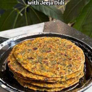 Saransh Goila Instagram - Most Delishaaas theplas I've had in my life have always been made by Jeeja didi (who's our star Marathi house help and also a fab cook) It's amazing how recipes can transcend boundaries a Gujarati recipe that is so popular all across that every household has their version and this isn't the OG way to make them but I love them. So we decided to share her Thepla recipe which she's been following for about two decades and while I can't roll those theplas like she does. I'd like to thank her for sharing her favourite recipe with us. How do you make them at home? 
.
.
Theplas 

3 Green chilies 
1 inch Ginger
Pound it into a paste 

Didi approved 😎🙂‍↕️

1/2 bunch Methi, chopped & washed 
1 tbsp Ginger & chili paste 
15g Jaggery 
1 tsp Red chili powder 
1 tsp Coriander powder 
1 tbsp White sesame seeds 
Salt to taste 
1/2 tsp Haldi powder 
2 tbsp Curd 
1 tbsp Neutral oil 
2 tbsp Besan 
Mix everything really well 

1 1/2 cup Whole wheat flour 
NO WATER! 

Knead it into a soft dough 
Now take a portion and roll 
the thepla BUT 

roll as didi shows 😮‍💨🤌🏻

😮‍💨🤌🏻

Cook the theplas on medium flame 
till golden from both sides & baste with oil 

Delishaaas 🤤🤤
