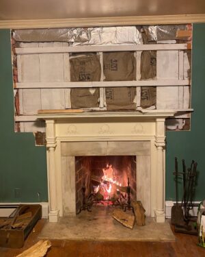 Sasha Frolova Instagram - Dedicated to ‘Before’
Before you actually know what you’re doing and before the fruits of your efforts are validated in finality.
This fireplace room is our winter salvation and a reason to collect more sticks, which has become my new favorite ex city girl hobby. 

For the renovation journey memoir- when we moved in the wall was soft behind the mantle and there were a few spots where the drywall was kicked in like someone got angry in steel toe boots. Remediation included removing old drywall, cleaning out a lot of mouse poop, reinsulating, painting interior cavity with Kilz for mold resistance, and mounting new drywall. Then many many layers of joint compound, paper tape on the seams and sanding to get the wall smooth and flush. Then I primed the new drywall and joint compound with PVA so it would be paint ready. 
For these projects, I learned how to do a butterfly drywall patch which is very useful for little holes that are too big for spackle! And it’s got a pretty name 🦋 I was really anxious about painting over the fireplace mantle because the wood is so delicate and I didn’t want to fill the details with paint but the wood had gotten very stained from what I like to imagine as excessive amounts of hookah and was splitting. So I used a teeny tiny art brush and the thinnest layer of paint I could apply… 

All I can say is goodbye teal fireplace room, it was nice to know you 🖖🏻