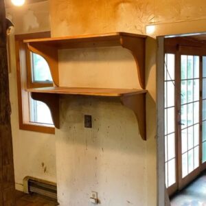 Sasha Frolova Instagram - Progress report:
The most daunting, challenging room in the house is by far the kitchen. Simultaneously the hearth of the home and a huge priority to make a safe, cozy room for creating, consuming and keeping company. Everyone suggested we drywall over the drywall but the old drywall had a crazy joint compound texture highlighted by grease and smoke to the point where you could tell where artwork used to hang in the room. We started by ripping the drywall out with an oscillating saw and a crowbar. Mouse poop and dust showering upon us. Mind you, before we had a working shower of the water variety. 
In this process we found original beams behind the drop ceiling! Beams, beams, beams! So we had to take the extra time to reveal those. Once the drywall was all removed we fogged the room with mold spray, filled any holes with mouse spray foam (found in the garden section at Home Depot), new rock wool insulation, and mold resistant drywall. We wanted to highlight some of the beautiful wood work we found in the walls when we demoed them so we made these three little cubbies that were already ‘framed out’. 

As for the appliances, even though I tried desperately to keep the refrigerator to spite everyone, even washed it in the stream before we had running water, it had to go. Hot tip: don’t pay someone to get rid of your fridge! Refrigerators are not allowed at dumps because of the coolant. Find a metal recycling plant and they will buy your fridge for a few bucks based on the weight. Dishwasher was broken. The oven was and is so grease caked but it’s Viking and I’m still trying to save her. My first attempt at cleaning the mysterious 1.5 inch thick goop in the burner trays I found a dead mouse stuck and nearly had to bring a feinting couch over for myself while I scooped it out with my five in one tool. 

The walls and my cracked fingers are now getting a layer of hydrated lime and sand at a 1:3 ratio and then a finishing coat at 1:1. We also framed out a couple of decorative cubbies using an oscillating saw, cut up pieces of paint mixing sticks, joint compound and scrap drywall. 

Onwards and upwards, 2024 ✨thank you for your love and patience @erinwolfmommsen