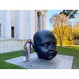 Sasha Sagan Instagram - I am 39 years old today. And also 25 weeks pregnant. And also the mother of an amazing 4 year old who whispers little pearls of wisdom to my belly (slide 2). And also wife to an irresistible man who very patiently takes dozens of photos of me with a giant baby head sculpture so that I can post two. Really just feeling very lucky and bursting with gratitude today ♥️🎂