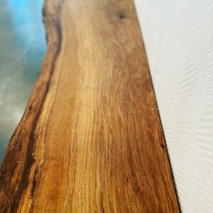 Scott Foley Instagram - Oak entryway bench. Latest project finished. Used part of a live oak slab that I brought from CA.  Through tenons for the solid slab legs. Filled checks with @totalboat 2 part epoxy and made bow ties from some Purple Heart courtesy of @urvi.ivru Adjustable rubber feet to make up for any measuring deficiencies I most likely made. Hand planed then used a card scraper and sanded to 150 grit, didn’t want to close up the pores. Finished with @rubiomonocoatusa oil plus 2C, oak. This thing is a beast, weighs about 200lbs.