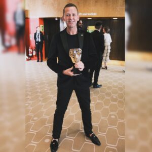 Scott Mills Instagram - We just won a BAFTA!! 

The awesome team from BBC Studios deserve this so much for putting on what many people say was the best Eurovision ever. It was quite something to pull off. 

Stunning on tv and in the arena, but what also became an extended party which drew everyone in for weeks, and that everyone wanted to be at. 

None of this would have been possible if not for the  city of Liverpool, who opened its heart to the song contest like no other, but most importantly to the people of Ukraine. It was their party in our house, and they were so proud. 

It was a joy to see, and Liverpool was the perfect city for it. 

The Grand Final was the most watched worldwide since modern records began. 

I’ll never forget it, and I feel so lucky to be part of this brilliant team of hard working and super talented people. 

I really hope Eurovision can continue to be one of the things that brings us all together.

Well done everyone  🏆❤️

👔 @twistedtailor | 👞 @elongshoes | @steviebstyle