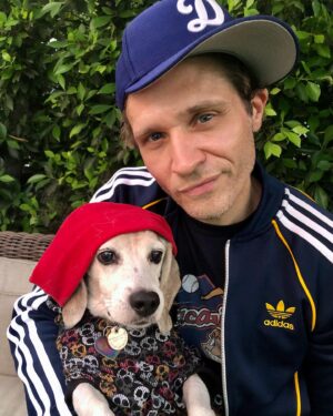Seamus Dever Instagram - Many of you knew the Legend that was Maizy the Beagle. It grieves us so much to tell you that she’s gone. She lived three lifetimes worth of dog lives. 17 years! 
We rescued you at Beagles and Buddies after you jumped in my lap and kissed my face, a signature Maizy move. She’s the only dog that I got to pick as a pet ever. She was “my fault” as we’d sometimes say. But what a life she had. 
She was a cover model for Life and Dog magazine, in a commercial for Best Friends Animal Sanctuary, 2nd place at the Race for the Rescues 5k run, she was on tv shows sets and even became a theatre dog at Laguna Playhouse. She had multiple backyards to get in trouble in and even once fulfilled her lifetime bloodlust goal of catching a squirrel. 
I have many scars on my body as the result of our disagreements concerning “what are you eating?” I guess I’m happy that I have those scars to remember her now. But she also healed me many times in ways she could never understand. 
She wasn’t a good girl but she did everything Maizy style. And maybe it’s better to be a one of a kind, original than be a good girl. Godamn it but we miss her so.