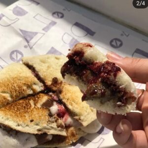 Sean Faris Instagram - Ohhhhhhh boy! On Sunday we went down to #pbjla at the Grand Central Market in downtown LA and got our homemade pb&j grub on! If you haven't tried it yet, you must! I would happily eat spoonfuls of the homemade cacao almond butter all by itself much less it being slapped onto 2 slices of fresh baked bread accompanied by a a heaping spoonful of ridiculously awesome superfood jam! Did I mention that they cut off the crust just like mom did?! Pinch me! Have I died and gone to heaven?! My word! I gotta new favorite spot!!! Cant wait to come back for more! #LifeIsAGift #💜MeSomePB&J #PB&JLA