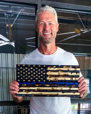 Sean Larkin Instagram - Huge thank you to Noah over at @starsandstripescompany for this custom wooden flag.  This beauty is going up in the Coptales&Coptales podcast studio.