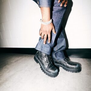 Shamier Anderson Instagram - Light but Excessive. 🥃

Outfit - @ferragamo 
Boots - @balenciaga 
Glasses - @prada 
Jewellery - @envision11.11 

Grooming - @cliptomaniac 

📸 @nicoledekhors