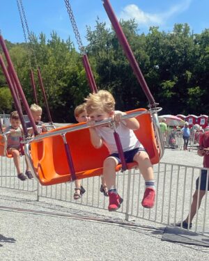 Shandi Finnessey Instagram - It’s always a good idea to go to the fair when it’s in town! Today was so much fun!! Charlie got to ride his first ride… ever! And my dad and I almost tossed our cookies on the pirate ship. But the highlight of the fair was watching Charlie eat his twisty cone. Seriously… check it out… (you’re welcome).

Oh! And I entered one of my chicken eggs in the “oddest egg” contest and won a second place ribbon. Sadly, my honey didn’t win… as I had to transfer the honey to a different container last minute (it’s a long story) and in the process, it got 2 air bubbles in it… which isn’t good. You don’t want any air bubbles in the honey. Hoping for a ribbon placement next year!
