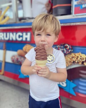 Shandi Finnessey Instagram - It’s always a good idea to go to the fair when it’s in town! Today was so much fun!! Charlie got to ride his first ride… ever! And my dad and I almost tossed our cookies on the pirate ship. But the highlight of the fair was watching Charlie eat his twisty cone. Seriously… check it out… (you’re welcome).

Oh! And I entered one of my chicken eggs in the “oddest egg” contest and won a second place ribbon. Sadly, my honey didn’t win… as I had to transfer the honey to a different container last minute (it’s a long story) and in the process, it got 2 air bubbles in it… which isn’t good. You don’t want any air bubbles in the honey. Hoping for a ribbon placement next year!