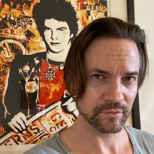 Shane West Instagram - Time for a haircut? Naaaah let’s see what happens 😜 

#fbf to being blessed to be a part of this project/world/lexicon.
#tbt @obeygiant gifting me this amazing art piece 
The Germs & Darby lives on forever 🔵
#whatwedoissecret #cuddles