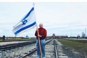 Sharon Bialy Instagram - A powerful image- my friend’s father went back to the camp in Germany to show them real strength!