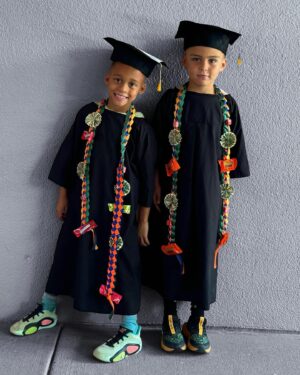 Shaun T Instagram - 👨🏾‍🎓👨🏻‍🎓 We are proud parents of kindergarten graduates! Both boys have tested into the Accelerated Learning Program at their school for next year! We are so thankful to on their amazing kindergarten teacher and our huge support system that has helped them get here! #twins #graduates #proudparents