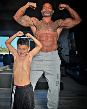 Shaun T Instagram - 😍What do you think of my posing partner?
#bodybuilding #fatherson
