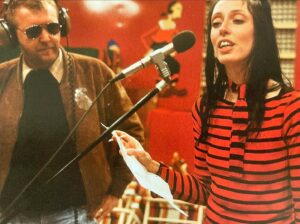 Shelley Duvall Instagram - Shelley Duvall and Harry Nilsson in the makeshift recording studio on set of Popeye, 1980 – if you look closely you can see the “paneling” was made out of egg cartons. 🎶 

Nilsson was hired to write the music for Popeye including Olive Oyl’s ballad, He Needs Me. A really lovely demo of Shelley singing the track exists on the newer edition of the Popeye soundtrack. I’ll share in my stories. 

Since the release of Popeye, He Needs Me has snuck its way into pop culture. Shelley’s recording is featured in Paul Thomas Anderson’s Punch-Drunk Love (2002), it also appears in a 2011 Nike commercial, and pop star Carly Rae Jepsen even sampled the tune in her song Everything He Needs. It’s also been trending on TikTok in recent months. Shelley and Nilsson made a timeless tune that is soft, vulnerable, delicate, and relatable. 

#shelleyduvall #popeye #oliveoyl #harrynilsson #1980s #malta #popeyevillage #robinwilliams #robertaltman #80s #groovy #vintage #musical #moviesoundtrack #heneedsme #moviefacts #cinema #behindthescenes  #fanpage #photoarchive #actress #celebrity #80sstyle